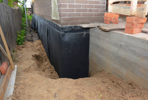 SJ Waterproofing Pros technician performing targeted Vapor Barrier Installation assessment in Delano, TN